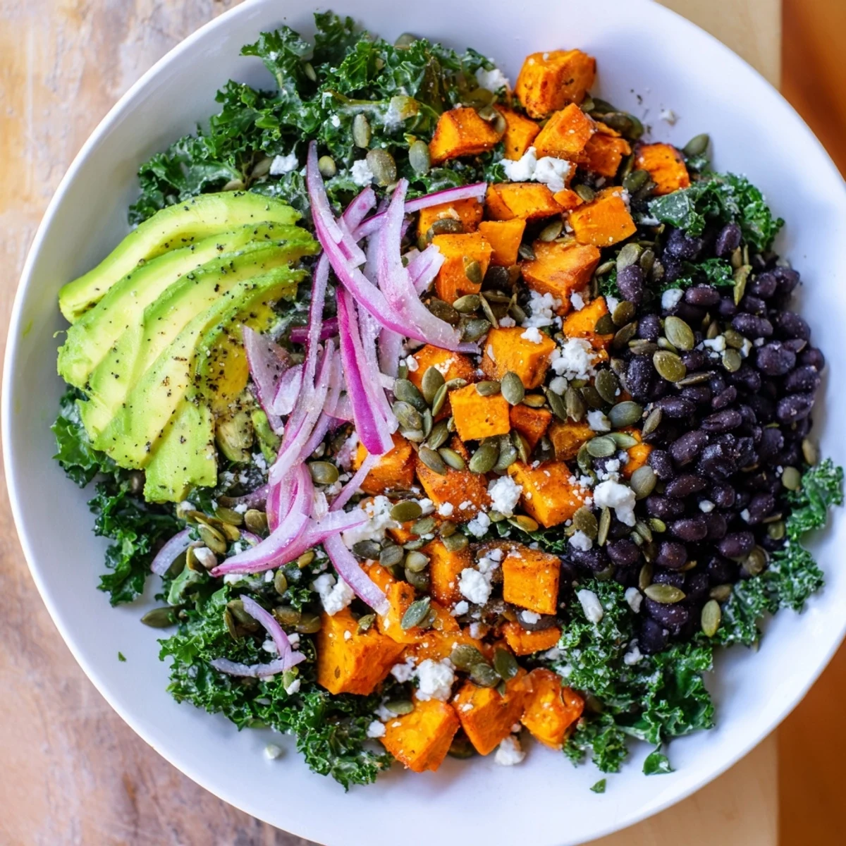 This hearty Massaged Kale Salad with black beans offers a satisfying and healthy lunch option.