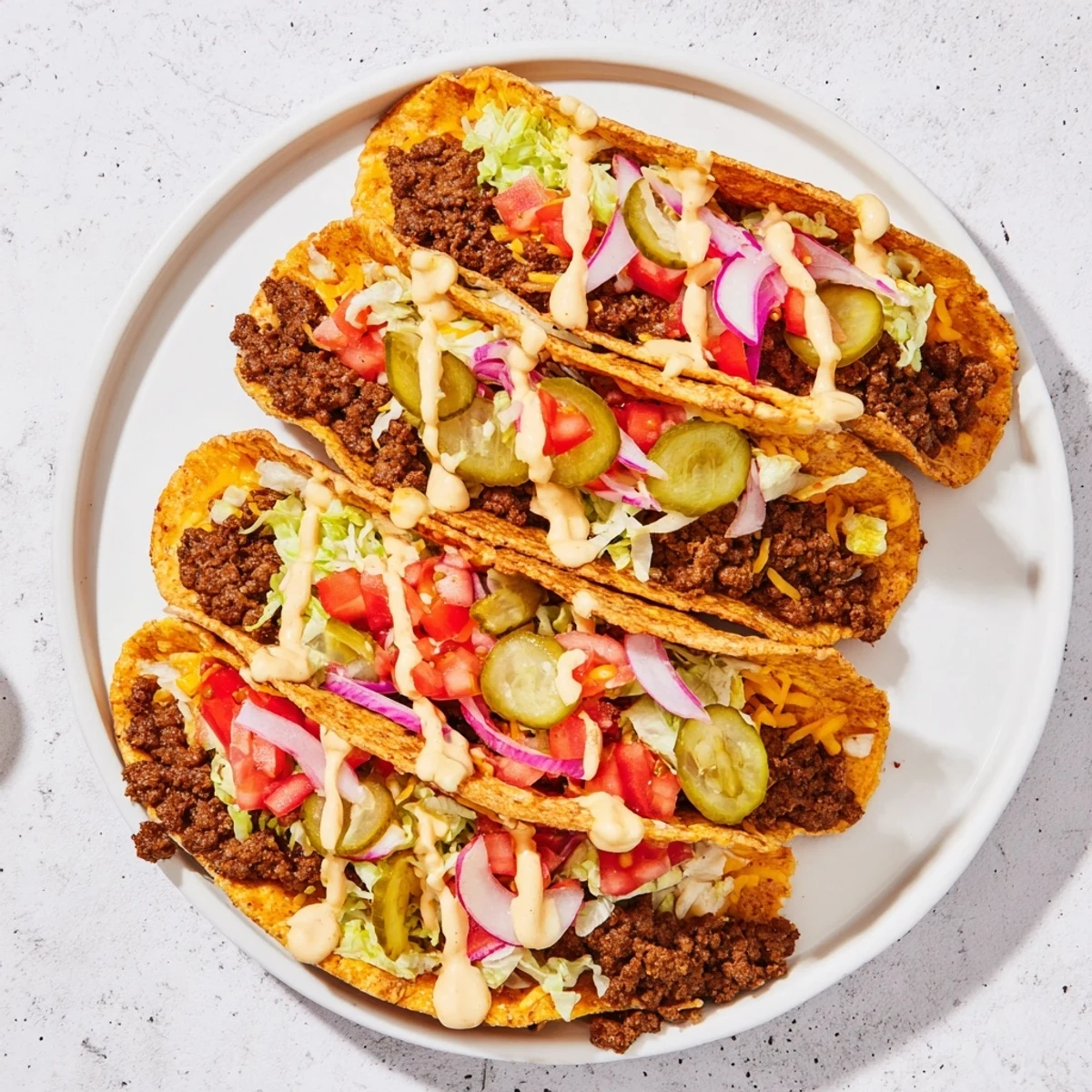 Crispy, cheesy Viral Cheeseburger Tacos with ground beef & fresh veggies, perfect for a quick dinner.