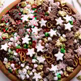 Imagine a vibrant Santa's Sack Candy Avalanche, overflowing with colorful treats like chocolate and cookies.