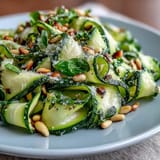 Elegant shaved zucchini ribbon salad, featuring crisp ribbons and fresh zest.