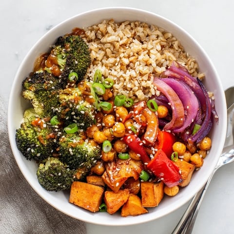 Vibrant Bold Sauce Drizzle Bowls topped with roasted vegetables and creamy miso-butter sauce.  