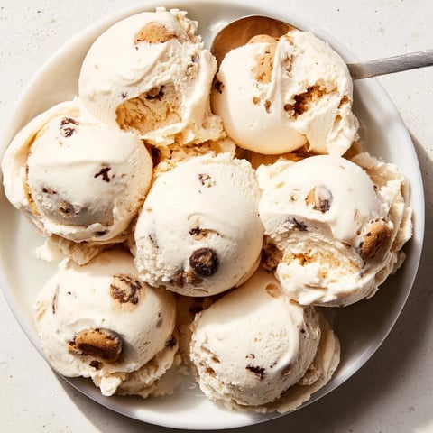 Creamy cottage cheese ice cream with cookie dough bites, a delightful frozen treat.  
