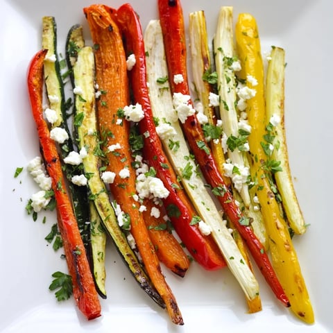 Golden roasted Christmas Sleigh Veggie Rails, a colorful, flavorful holiday appetizer arrangement.