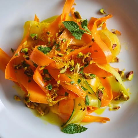 Citrus Carrot Ribbon Salad with bright orange and lemon slices, a colorful, fresh salad.