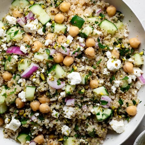 Jennifer Aniston Salad, bursting with fresh herbs, feta and toasted nuts, ready to eat.