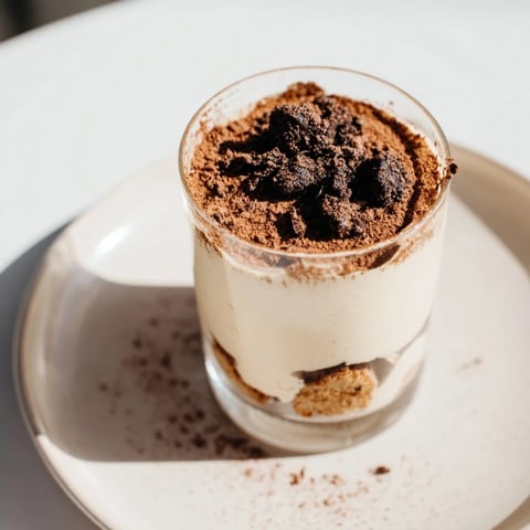 Deconstructed Tiramisu Shots in small glasses with visible layers, ready to serve and enjoy.