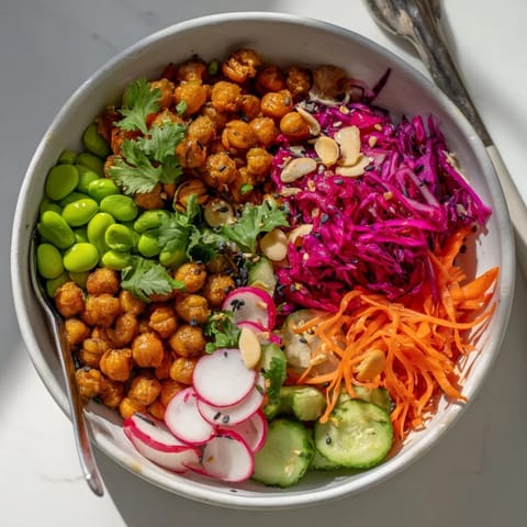 A delightful ASMR Crunch Snack Bowl featuring bright veggies and crispy textures.  