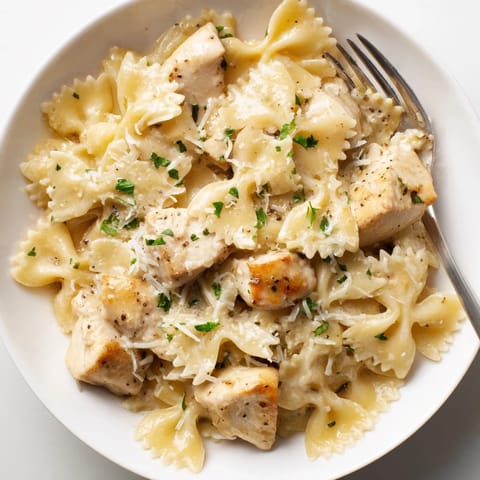 Delicious Mozzarella Garlic Butter Chicken Bowties, featuring tender chicken and melted cheese.  