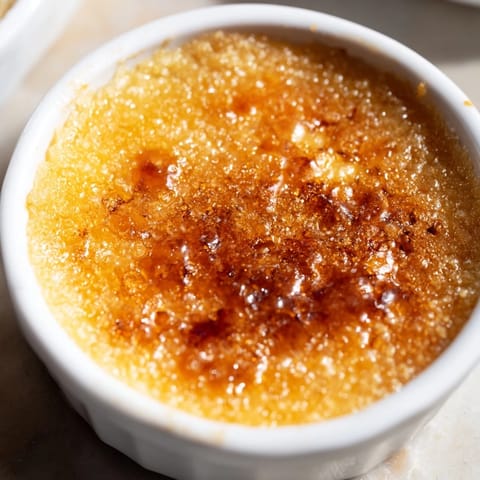 Luxurious 3-Ingredient Crème Brûlée: imagine the caramelized sugar topping and creamy custard texture.