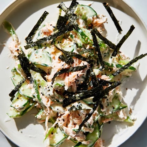 Fresh California Roll Cucumber Salad with sesame seeds and nori, a bright summer appetizer.