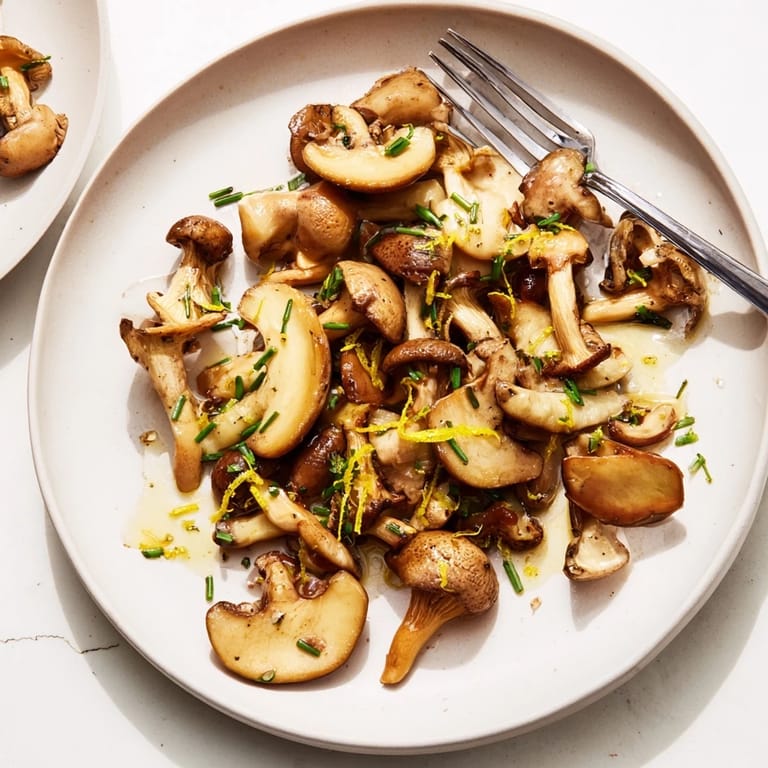 A close-up of the delicious Enchanted Forest Mushrooms, perfectly sautéed with garlic in white wine.